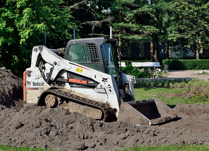 A Bobcat T650 compact track loader in the VDNKh, Moscow, Russia. A side view.